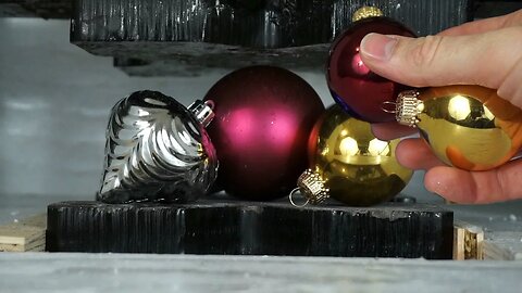 Shatterproof vs Traditional Ornaments Crushed By Hydraulic Press