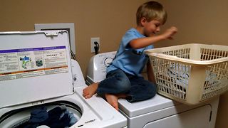 Little Boy Is The Cutest Laundry Helper