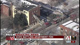 Crews working three-alarm apartment fire in east Kansas City
