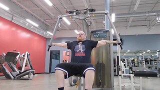 Chest fly machine 200 lbs 12 reps