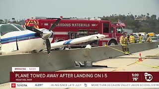 Plane towed from I-5 after landing in Del Mar