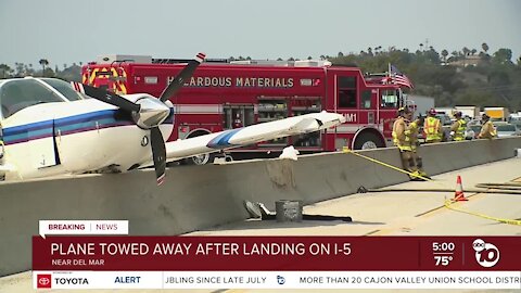 Plane towed from I-5 after landing in Del Mar