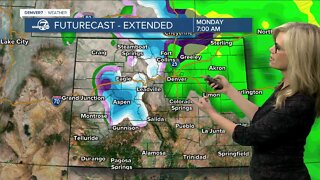 Cooler air moving in with rain and snow