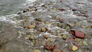 Water running down a river in Colorado during the summer