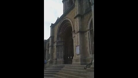 Outside St Anne's Cathedral in Belfast. Checking out the stonework and the symbolism.