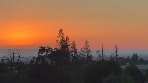 Sunset at the dry and windy Montgomery Hills Park on a hot summer evening.