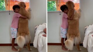 Little boy hugs his doggy best friend