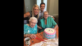 Great-grandmother cuts cake for emotional baby gender reveal