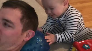 Baby Pulls Innocent Prank On Dad, Giggles Uncontrollably