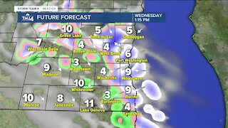 Chilly Tuesday with a slight chance for rain/snow showers