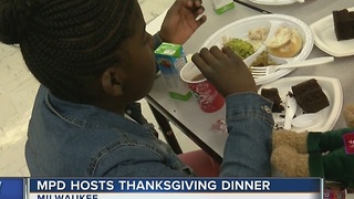 MPD officers hosts Thanksgiving dinner