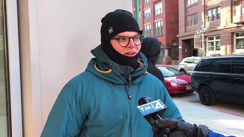 Fans wait in the cold for a hot Shake Shack burger