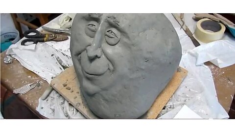 Face Stone Ferrocent Sculpture