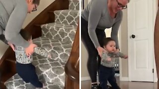 Mommy Helps Excited Baby Go Up The Staircase