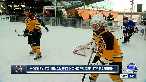 Denver police, firefighters and paramedics play hockey for fallen deputy Zackari Parrish