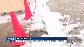 Woman wants Comerica held accountable for fall due to faulty curb