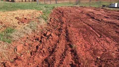 Preparing earthworks bench terrace for market garden