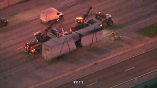 U.S. mail truck trailer nearly split in half on I-95 southbound in Lake Worth