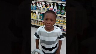kid tries to steal from store, gets caught in the act..