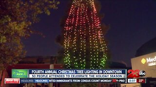 Community members gather in Central Bakersfield for tree lighting ceremony
