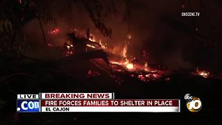 Fire forces families to shelter in place