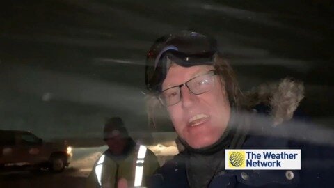 Weather Reporter AND tow truck get stuck in winter storm