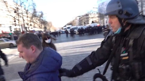 Paris police manhandle French Journalist Remy Buisine at the Freedom Convoy protest in Paris, France