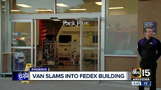 Van slams into FedEx building in Phoenix