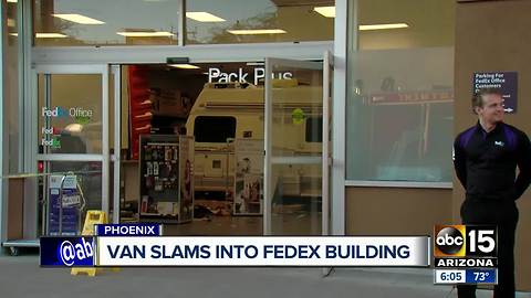 Van slams into FedEx building in Phoenix