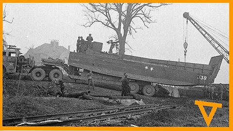 US Dragon Wagon carrying LCM 3 USN Vehicle Landing Craft.