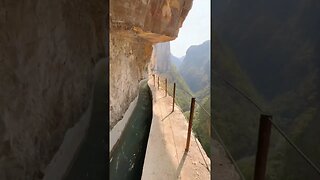A canal hanging from a cliff hidden in the deep mountains of Oolong