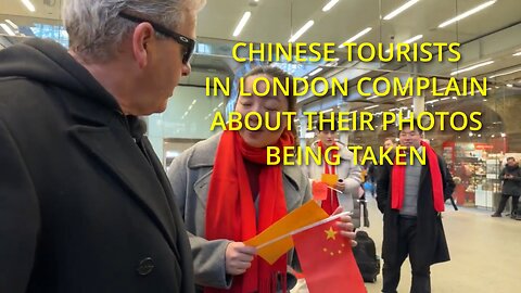 Pianist in a public place being challenged by Chinese tourists - Central London train station