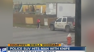 Police SUV hits man with knife