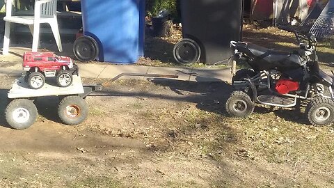 mini quad huge dude pullin trailer with RC truck! 49cc engine @CarsandCameras