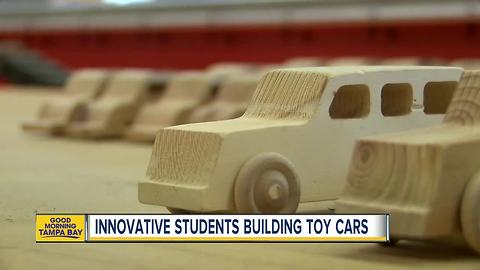 Students manufacturer machines to make 1,000 toy cars a week for kids in war-torn countries