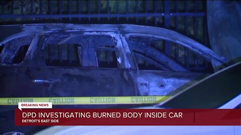 DPD investigating burned body inside car