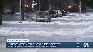 Crews work to plow side streets