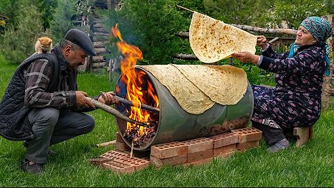 Baking Bread on a Barrel Over Wood Fire