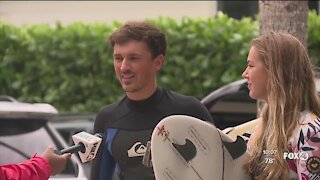 Surfers ride Eta's waves