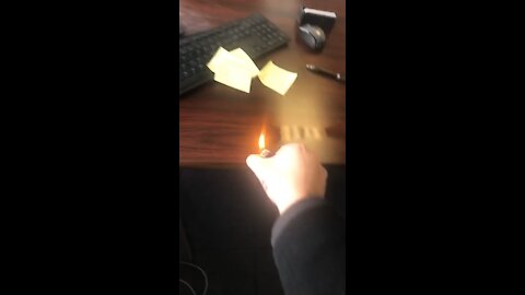 Lighting coworker’s desk on fire