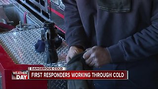 First responders working through dangerous cold