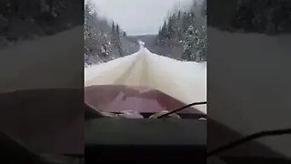 Winter trucking off road, small narrow bridge over the St. John River