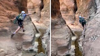 Daredevil incredibly parkours across desert canyon wall