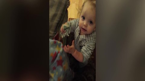 Cute Little Girl Won't Let Go of Mom's Money