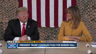 Trump touts border wall as shutdown enters sixth day