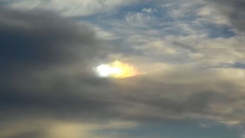 Strange light reflecting cloud shapes in the sky