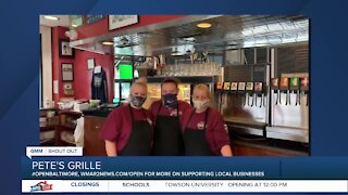 Pete's Grille in Baltimore says "We're Open Baltimore!"