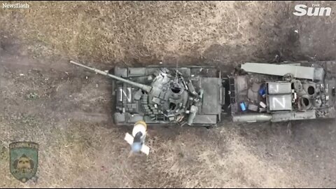 Precision Strike: Ukrainian Drone Drops Bomb Into Open Russian Tank Hatch