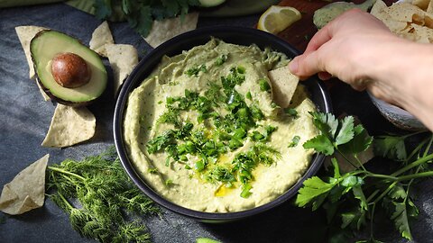 Delicious and Healthy Dip. Green Goddess Hummus with Fresh Herbs and Avocado