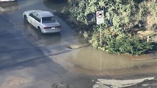 Water main break causes flooding on Englewood street, yards